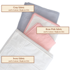 Three folded fabric samples labeled 'Gray', 'Rose Pink', and 'Ivory' with text indicating 100% cotton and 'Made in USA'.